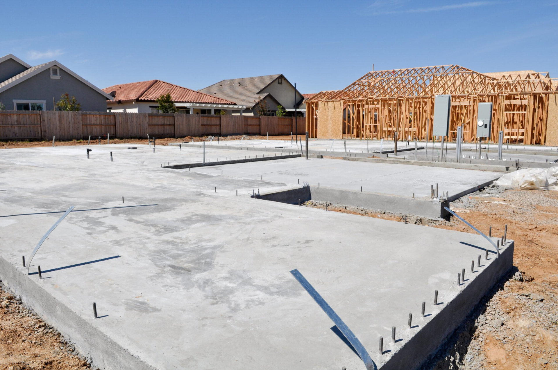 Completed residential foundation slab on a new construction lot